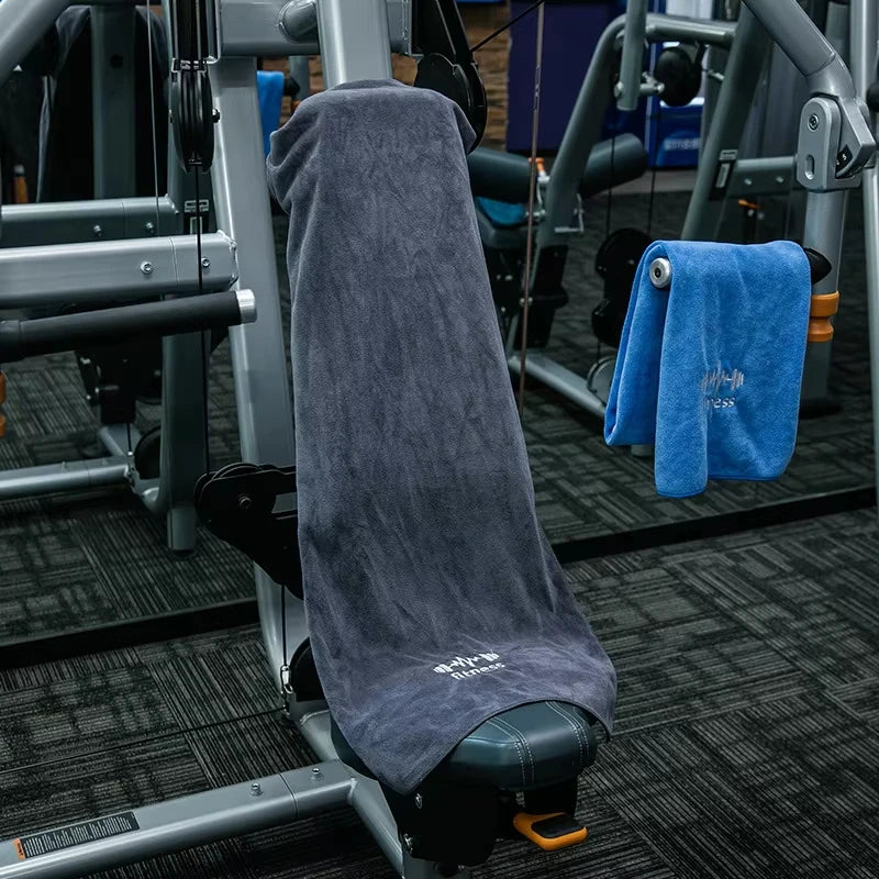 Picture of the Microfiber Towel on a Gym bench.