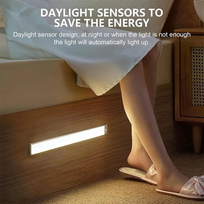Rechargeable Ultra-Thin Cabinet Light beside a bed.