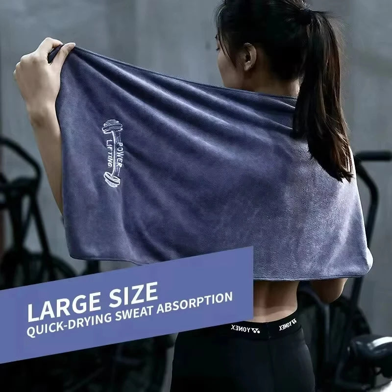Person holding the wide Microfiber Towel.
